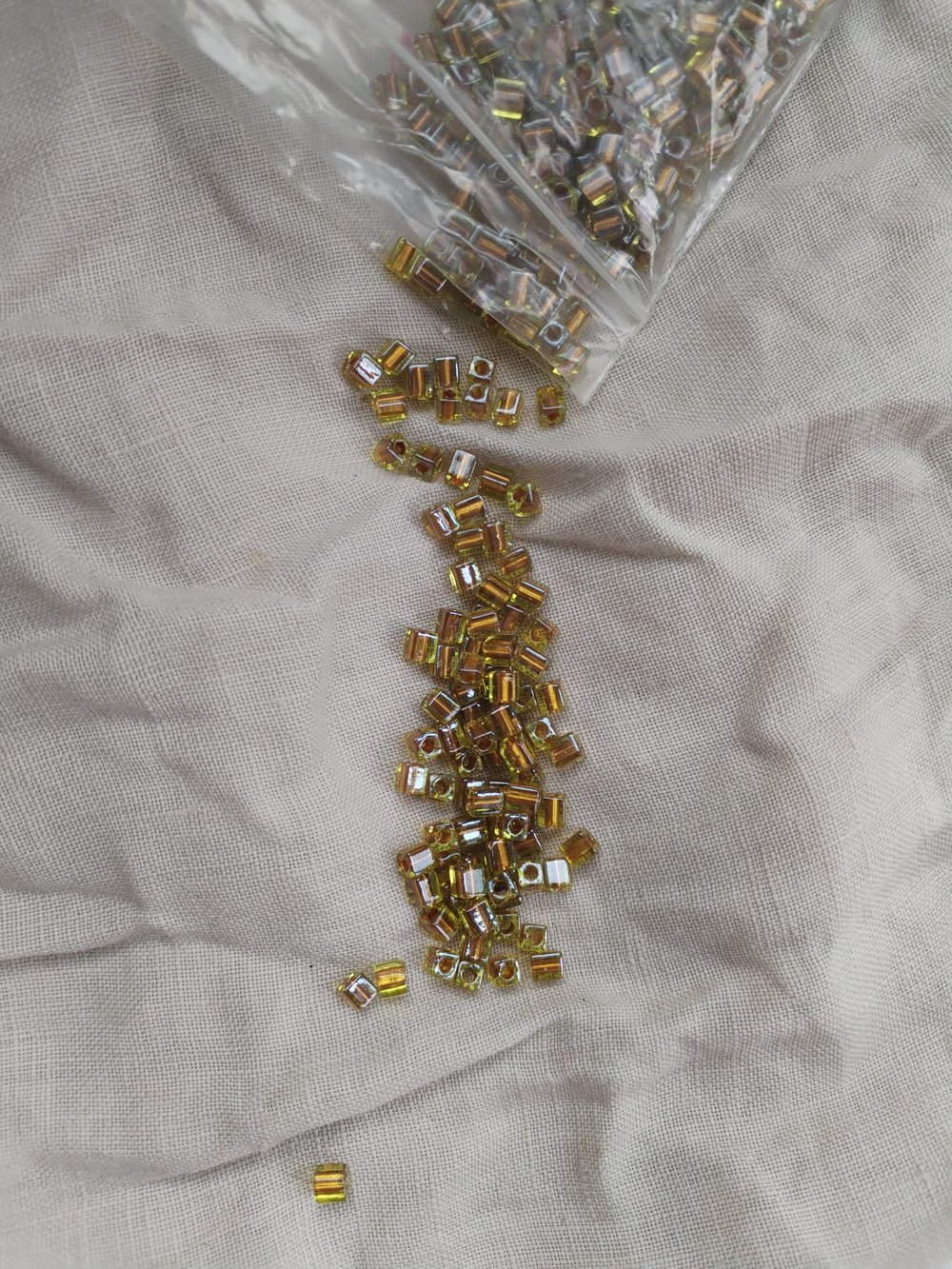 Image of gold cube beads