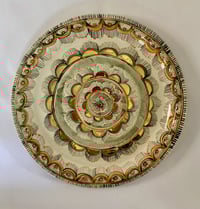 Image 1 of Orange and gold plates