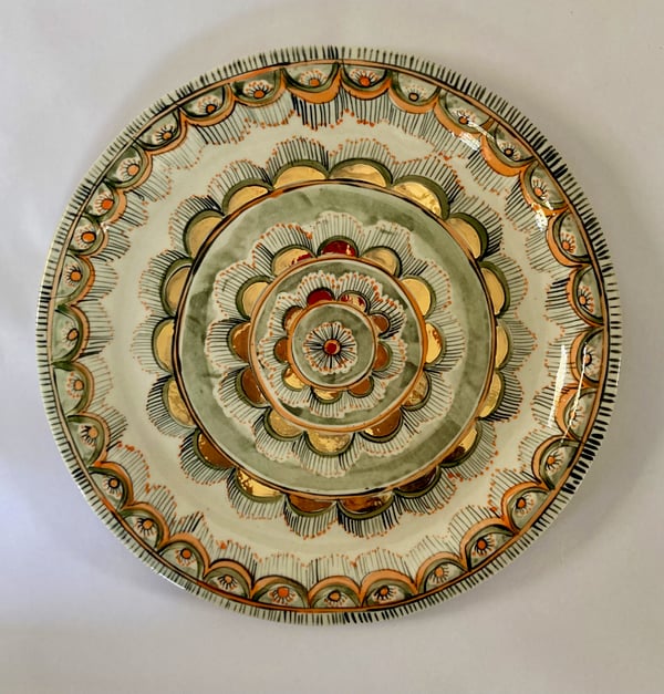 Image of Orange and gold plates