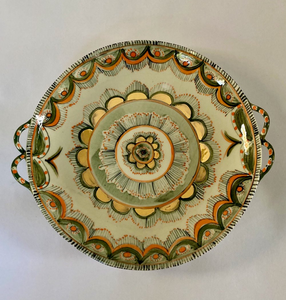 Image of Orange and gold plates