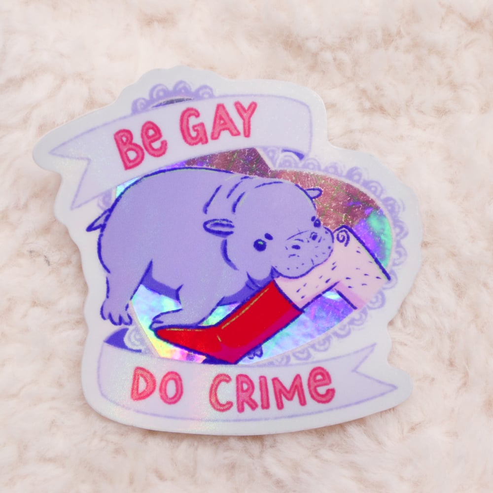 Image of Be Gay Do Crime Holographic Pygmy Hippo Sticker