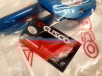Image 1 of New Cusco front upper strut brace for Pao, Be-1, Figaro and K10 Micra/March