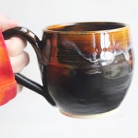 Image 7 of Amber Brown, and Matte Black Pottery Mug, 14 oz. Handcrafted Coffee Cup, Made in USA 