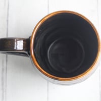 Image 9 of Amber Brown, and Matte Black Pottery Mug, 14 oz. Handcrafted Coffee Cup, Made in USA 