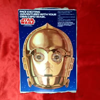 Image 1 of C-3PO (Star Wars) - Kelloggs C-3PO's Cereal mask (1984) - backside