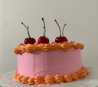 Image 2 of Festive Glittery/ Sparkle Cake for display/ fake cake/ orange and pink cake/ red cherries/fake fo...