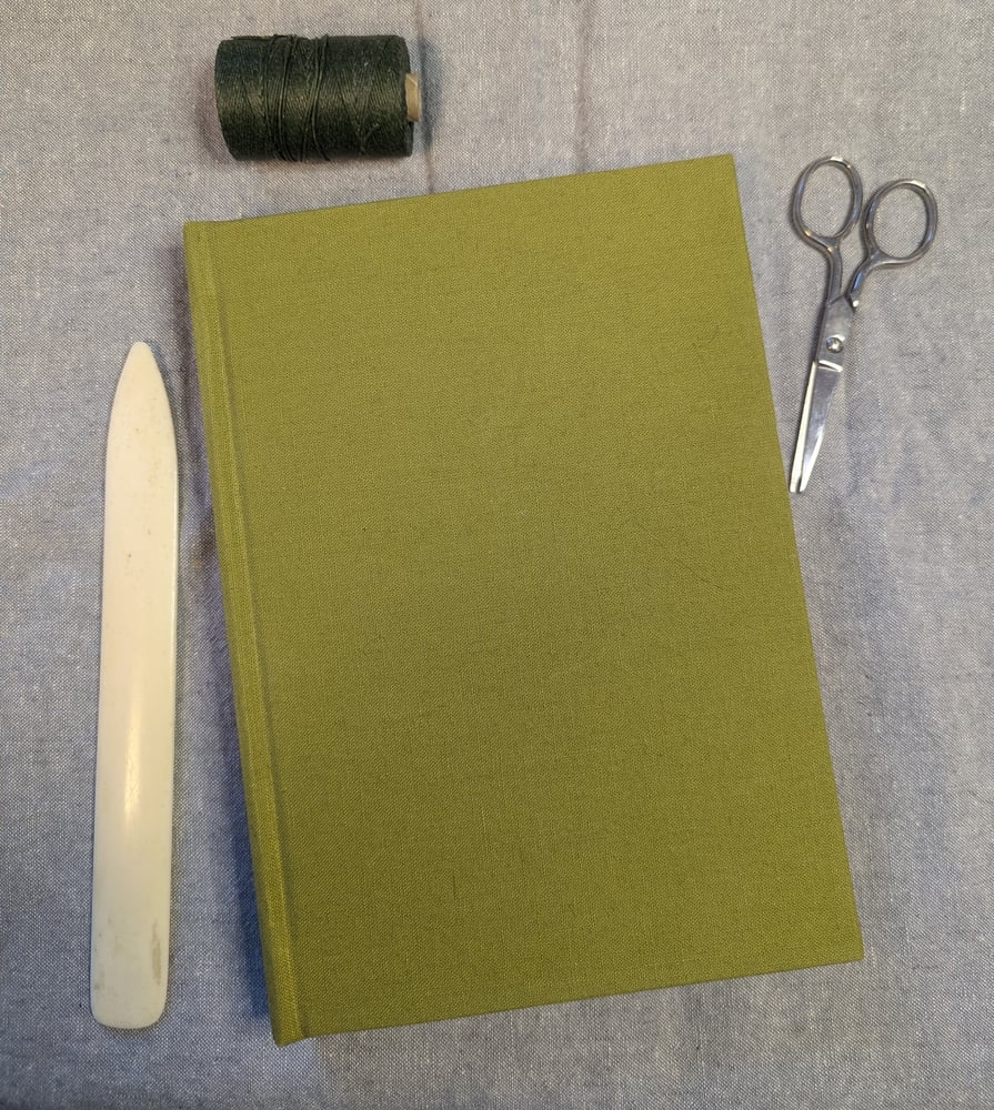 Image of Medium Green Sketchbook with Colored Papers