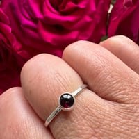 Image 1 of Sterling Silver Stacking Ring with a Hammered Texture and Garnet