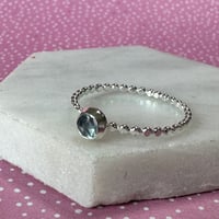 Image 2 of Sterling Silver Stacking Ring with a dotty silver band and Blue Topaz