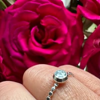 Image 1 of Sterling Silver Stacking Ring with a dotty silver band and Blue Topaz