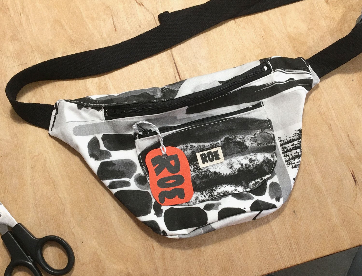 Image of BLACK AND WHITE COLLAGE WAIST BAG 