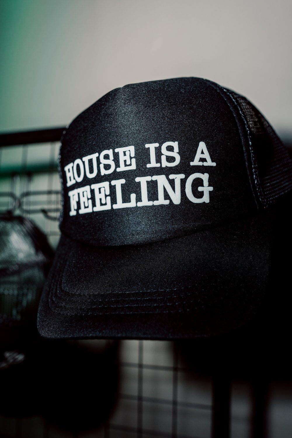 'HOUSE IS A FEELING' TRUCKER HAT 