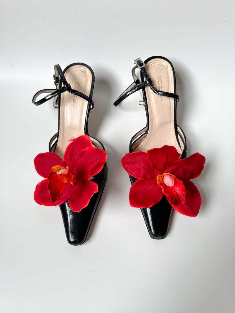 Image of red cymbidium orchid shoe clips 