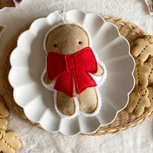 Image of Gingerbread man with bow