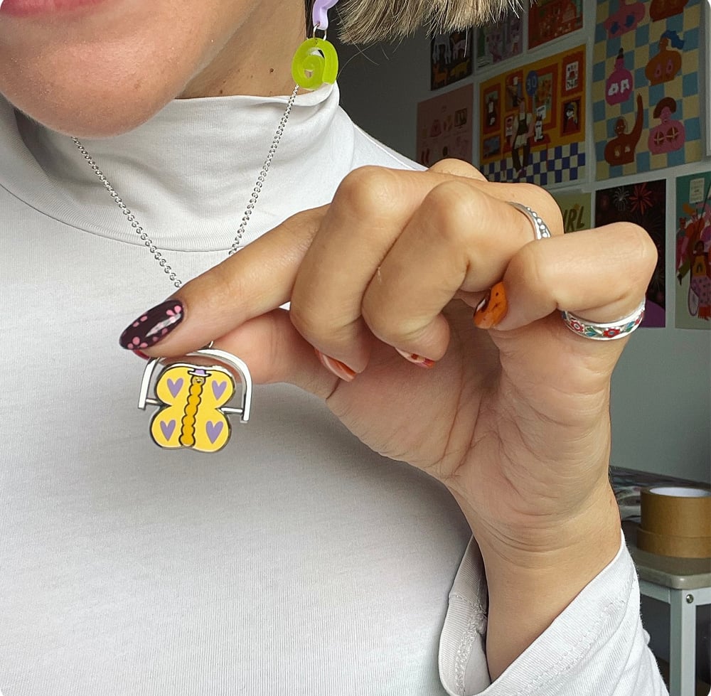 Image of Liz Harry X Ellastrated Metamorphosis Fidget Spinner Necklace