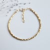 Gold filled faceted bracelet with glass