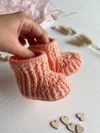 Image 1 of Peach Baby booties for newborn girl