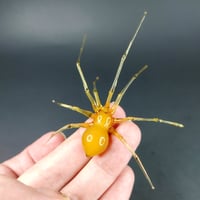 Image 1 of Mustard spider figurine 1/2