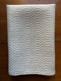 Image 1 of Handwoven linen tea towel in m’s and o’s