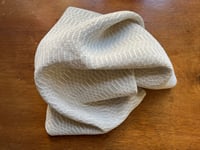 Image 2 of Handwoven linen tea towel in m’s and o’s