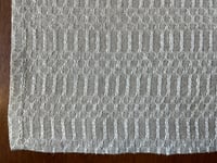 Image 5 of Handwoven linen tea towel in m’s and o’s