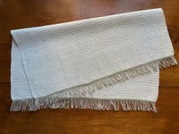 Image 5 of Handwoven linen tea towel with fringe in m’s and o’s