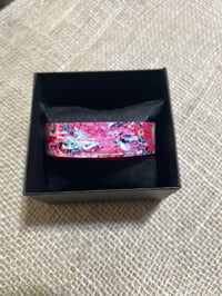 Image 1 of Bright pink, thin aluminium cuff bracelet.
