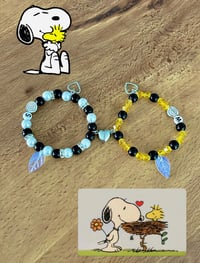 matching snoopy and woodstock bracelets