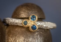 Image 1 of 'blue trine no.5' - Recycled silver and 9ct gold ring with blue sapphire