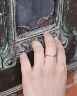 Image of 18ct gold 2mm floral carved wishbone ring