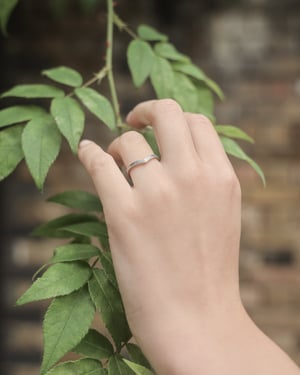 Image of Platinum 2mm flat court laurel leaf and milled edge engraved wishbone ring