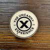 The Uncanny Experience Acrylic Pin