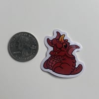 Image 2 of Lil’ Red Guardian (Teeny Sticker)