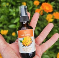 Image of 2 oz. Farm grown Organic Calendula with Jojoba oil