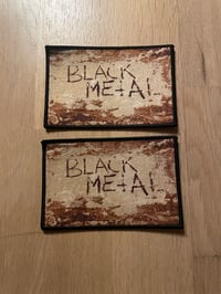 Black metal wall patches.