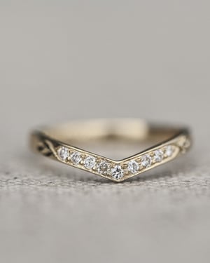 Image of 18ct Yellow gold white diamond set wishbone semi-eternity ring