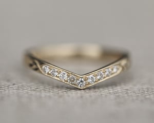 Image of 18ct Yellow gold white diamond set wishbone semi-eternity ring