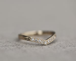 Image of 18ct Yellow gold white diamond set wishbone semi-eternity ring