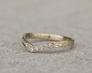 Image of 18ct Yellow gold white diamond set wishbone semi-eternity ring