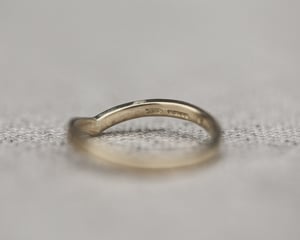 Image of 18ct Yellow gold white diamond set wishbone semi-eternity ring