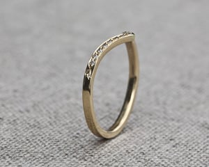 Image of 18ct Yellow gold white diamond semi-eternity wishbone ring