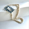 Art deco buckle and pearl necklace