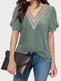 Green puff V-neck top