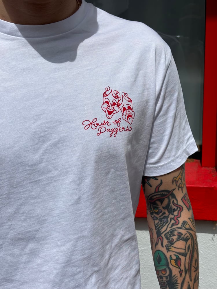 Image of Red and white tee