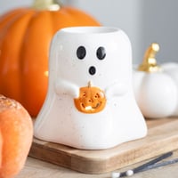 Ghost Oil Burner Holding Pumpkin