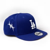 Image 1 of New Era 9 Fifty with logos Glow in the dark