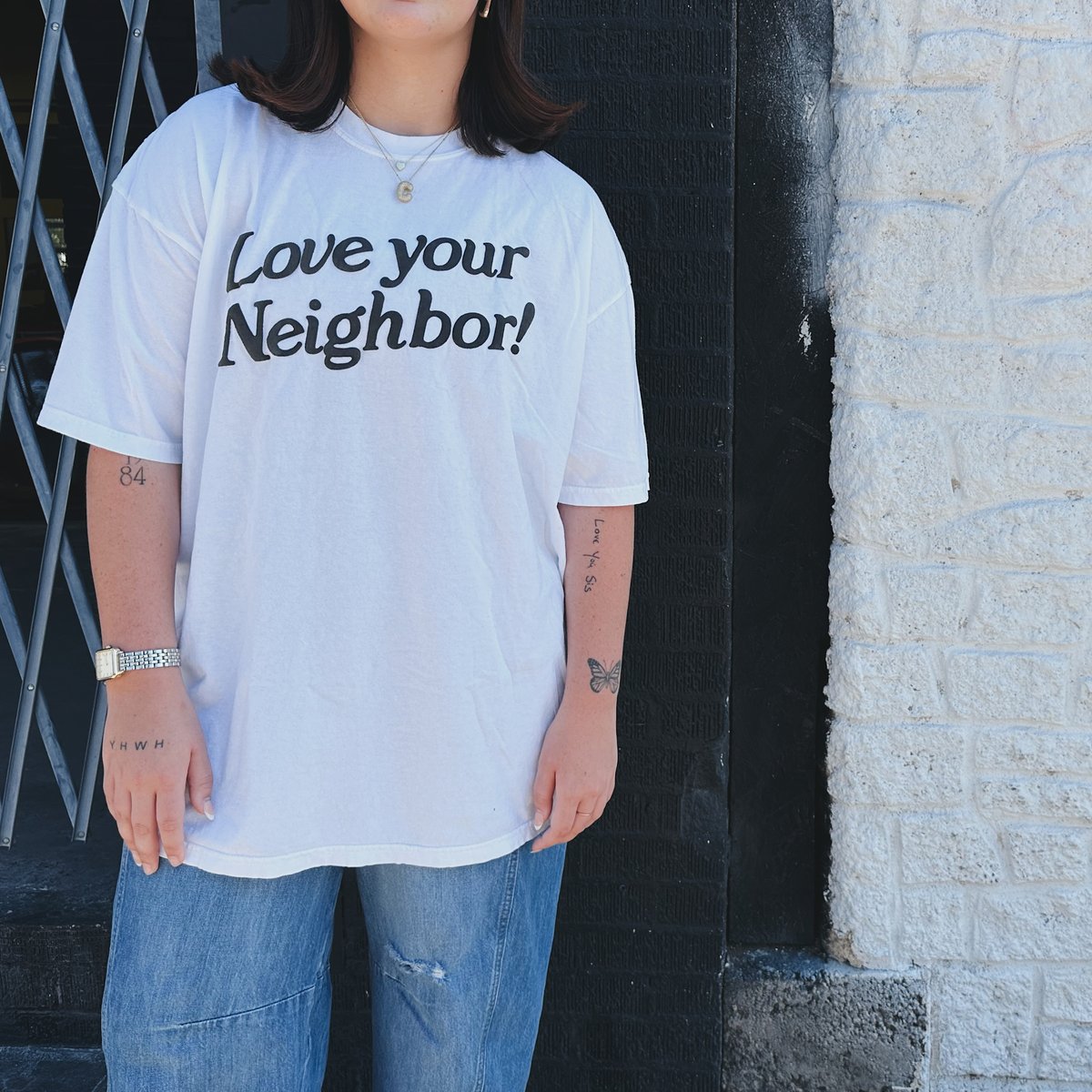 Image of white & black tee