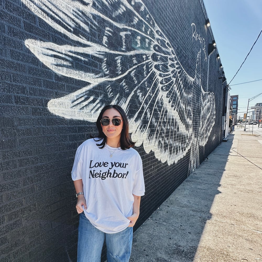 Image of white & black tee