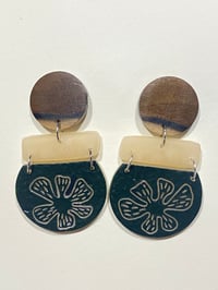 Translucent flower Carving with Tasmanian Blackheart Sassafras Studs