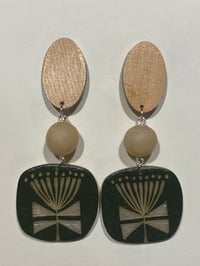 Abstract flower Carving with Tasmanian Huon Pine Studs